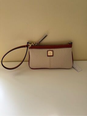 Brand New Dooney & Bourke Leather Large Slim Wristlet in Bone with Tan Trim.